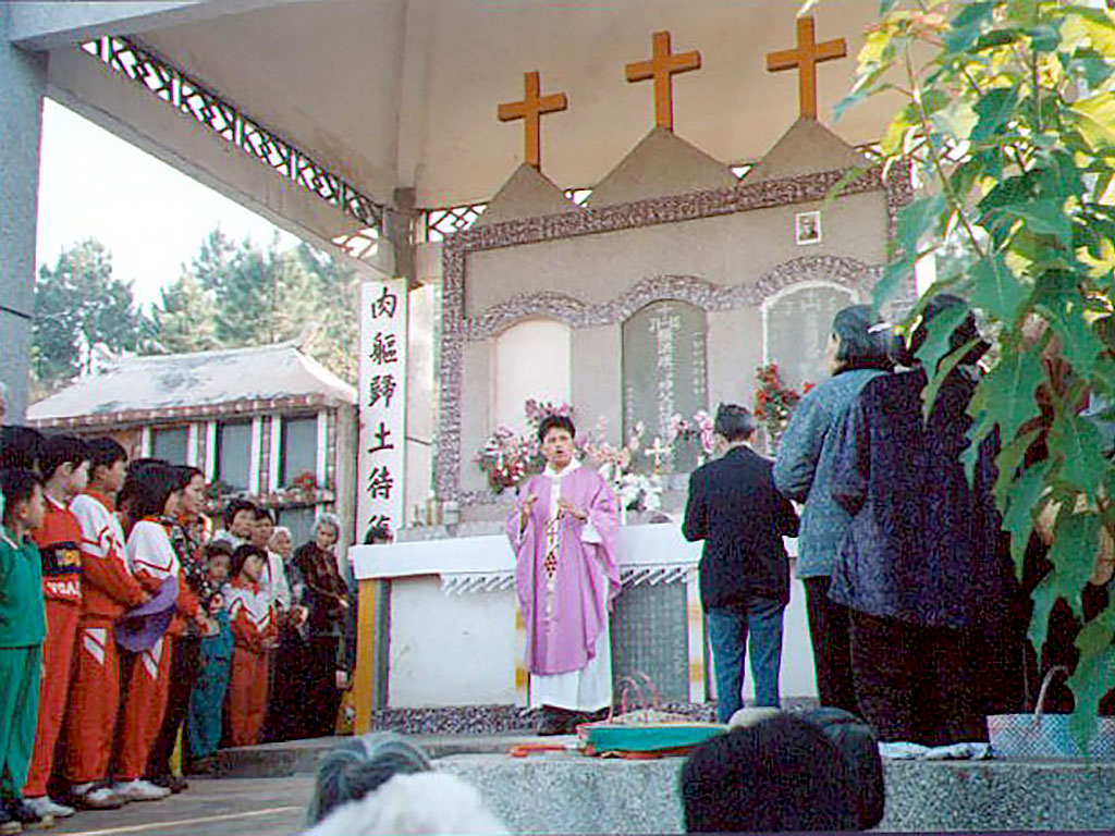 Chinese Catholic Priest presiding at service